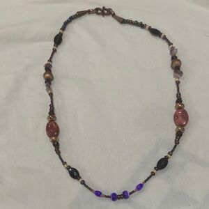 Elegant Beaded Necklace with Purple and Gold Accents